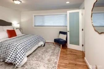 The expansive primary suite offers a peaceful retreat.