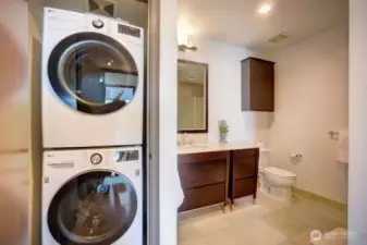 Stackable Washer/Dryer only 2 years old plus built-in storage behind door