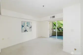 Spacious bedroom also has slider to deck