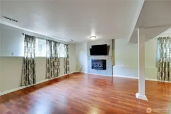 There are 2 living spaces in the basement.  This is the living space that has a 3/4 bath.