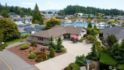Waterfront home in Shelter Bay with gorgeous landscaping and plenty of parking.