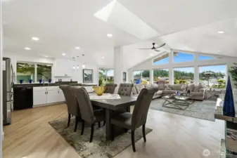 Open concept living in this light and bright waterfront home with shared dock.