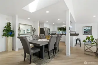 Dining Room has built-in buffet. Laundry Room, Half Bath and Garage access to left of Kitchen.