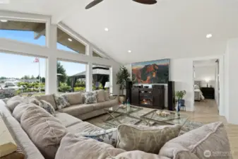 The expansive windows make this home light and bright in addition to bringing nature indoors.