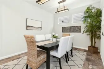 Large dining room with elegant lighting.