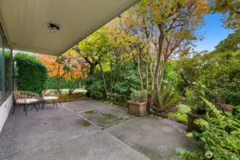 Beautifully landscaped surroundings provide a serene, private outdoor backdrop.