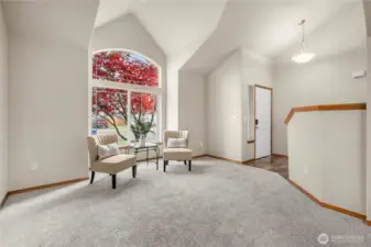 Entry way with new laminate hardwood leading to upstairs living areas