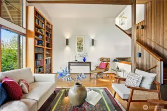 View from living room up the 3-story open entry stairs