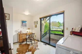 Second floor office/laundry with access to backyard and patio