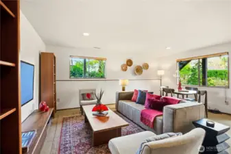 Large lower level den room for entertaining and relaxing - backyard access to patio and garden