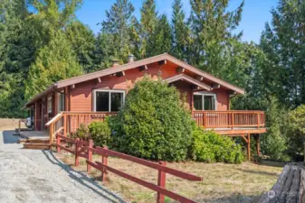 Solid timber home with 50 year copper roof has a horizon view of the mountians between the tree tops.