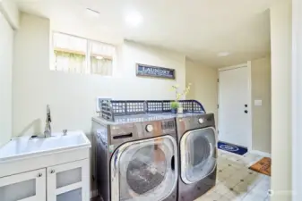 Washer & Dryer with Laundry sink.