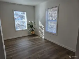 Formal Dining Room with corner windows.