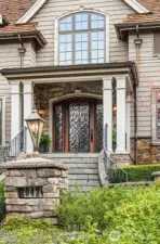 Stately presence with   Pennsylvania blue stone entry steps and circular drive