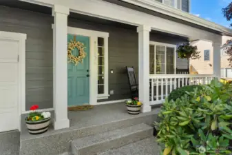 Happy vibes overwhelm you as you approach the entry! Tasteful accented front entry and a spot for morning coffee on the front porch.