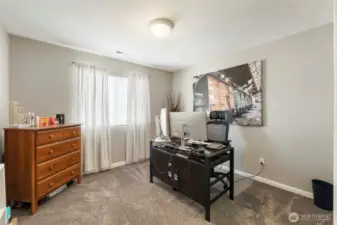 Four of four Guest bedrooms currently utilized as an office.