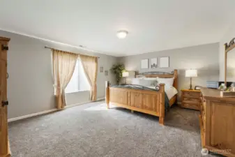 The Primary suite is enormous! Easily supporting a King size bed and furniture with room to spare!