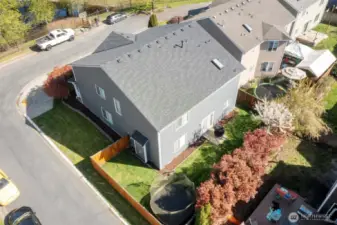 Aerial views show the fenced backyard and well-maintained landscaping. Located on a dead-end street with minimal traffic.