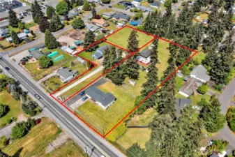 The lot offered is the back square noted in this picture. The duplex is also for sale.