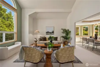 Formal living room with vaulted ceilings.