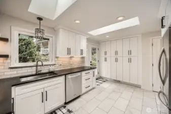 Lots of natural light and new cabinets throughout kitchen w/ tons of storage