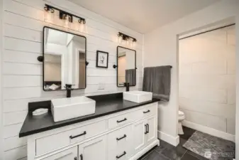 Updated primary bath w/ tile shower