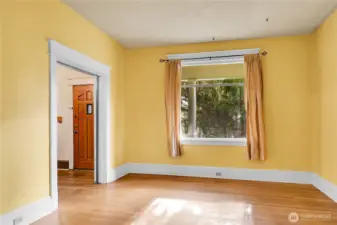 Intact pocket door to the parlour/living room.