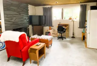Imagine movie nights or a game room here.