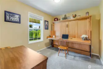 Main floor bedroom with closet and views of front yard. Trundle bed is negotiable.