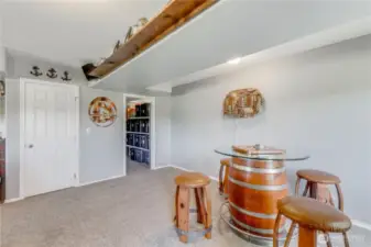 Massive storage with shelving & wine rack stays. Wine Barrel Table and Chairs are Negotiable.
