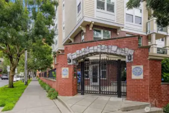 Secure entry into IV West. Built in 2003, the building offers modern living while its brick facade complements the classic charm of Queen Anne.