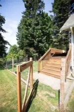 Newly stained back deck along west side of house