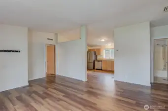 Enter into your new home. Updated vinyl plank flooring.