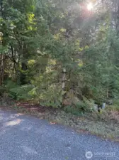 Beginning of property showing utilities at street.