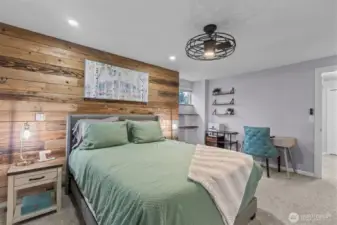 Primary suite with a walk-in closet and beautifully remodeled ensuite bath.