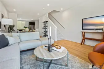 Light, bright, and wide open! This spacious living area is designed for gathering, relaxing, and everything.