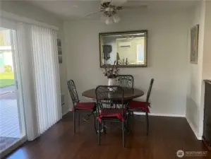 Dining room open to covered deck/ patio.