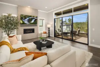 Grand Living space with Stacking Slider opening to the front deck