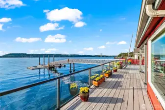 Expansive decks connect the homes, creating the perfect setting for gatherings, relaxation, and sunsets.