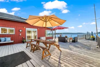 Multiple lounge and dining areas offer seamless indoor-outdoor living with sweeping views.