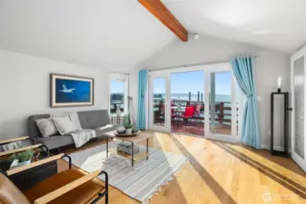 Open-concept living with seamless flow from indoors to the deck.