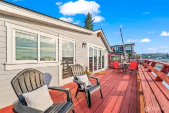 Deck with built-in bench seating, perfect for relaxing and enjoying the Sound.