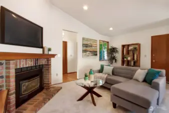Spacious family room with gas fireplace.