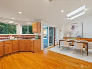 The spacious kitchen has lots of room to prepare and cook - with a 2nd eating area (or flex space) attached