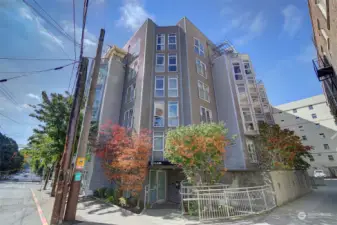 Unit 202 is on the 2nd floor of the Marq Condominiums which were built in 2004 and located at the threshhold of Capitol Hill.  This six-floor building has 48 units.  The Capitol Hill Light Rail Station is an 8-minute walk up the hill to Broadway, and the downtown Westlake Light Rail Station is just a 15-minute walk down the hill.