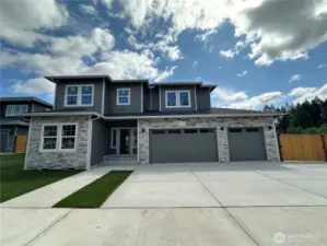 Full landscaped, RV parking, 3 car garage, extensive stone work