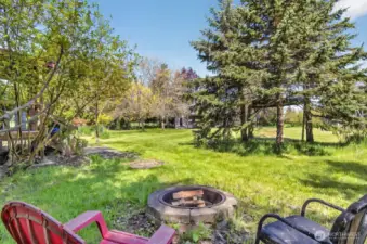 View of the spacious grassy area between Cottage and the Bunkhouse.