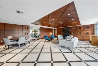 Welcome to the secure Waterview building—this elegant lobby offers a warm first impression and convenient access to the elevator, mail/package room, and resident-only gym.