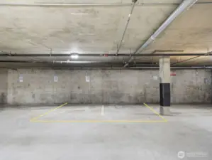 This unit includes two reserved, side-by-side parking spaces in a secure, resident-only garage—complete with door ding protection thanks to a structural post on the right side. Enjoy the ease of direct building access, making entry seamless in any weather.