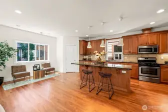 Breakfast nook instead of sitting area by the windows.